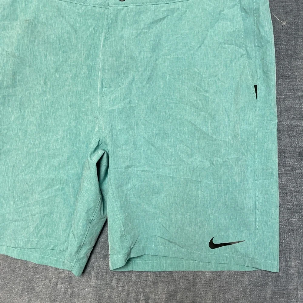 Nike Swim Board Shorts 38 Aqua Green Swoosh Logo Flat Front Slash Pockets Summer